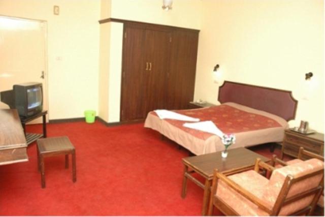 Hotel Preethi Palace Ooty Rom bilde