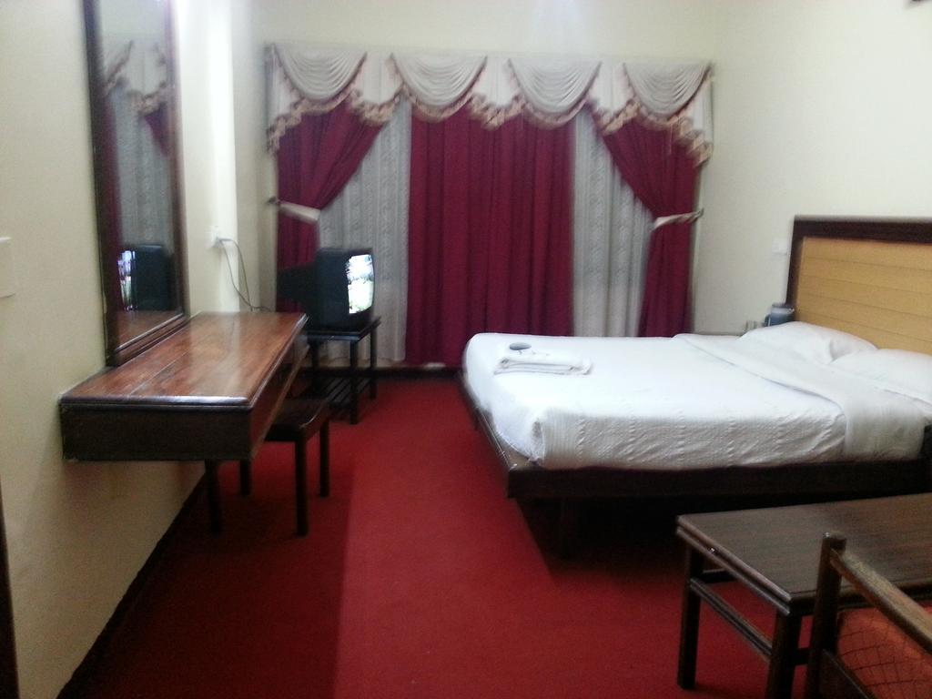 Hotel Preethi Palace Ooty Rom bilde