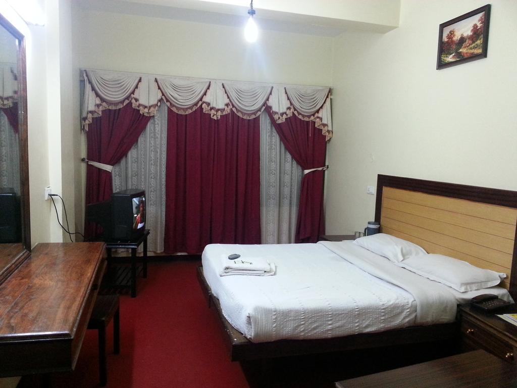 Hotel Preethi Palace Ooty Rom bilde